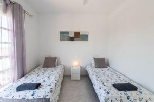 Ένα ή περισσότερα κρεβάτια σε δωμάτιο στο Casa Acoran with Jacuzzi