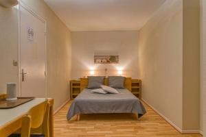 Postel nebo postele na pokoji v ubytování La Bastide d'Albignac + 37 fotografií