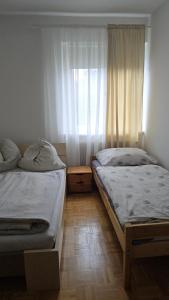Postel nebo postele na pokoji v ubytování Apartment Dolina 8a Kärnten KLagenfurt