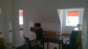 Una televisión o centro de entretenimiento en Hotýlek.eu