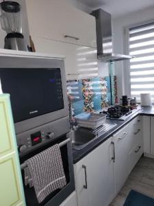 Køkken eller tekøkken på mieszkanko Kołobrzeg