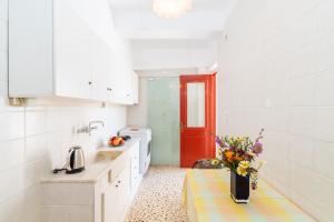 Kuchyň nebo kuchyňský kout v ubytování Aloe Apartments