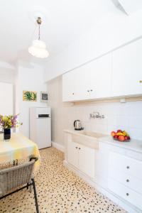 Kuchyň nebo kuchyňský kout v ubytování Aloe Apartments