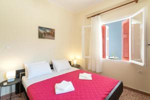 Postel nebo postele na pokoji v ubytování Aloe Apartments