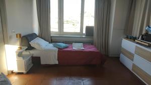 Postel nebo postele na pokoji v ubytování Verona Relax & Stay ROOMS