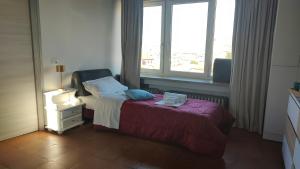 Postel nebo postele na pokoji v ubytování Verona Relax & Stay ROOMS