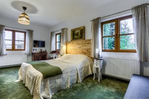 Postel nebo postele na pokoji v ubytování Siedlisko Nawiady - hotel butikowy