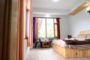 Postelja oz. postelje v sobi nastanitve Rest N Ramble - Manali