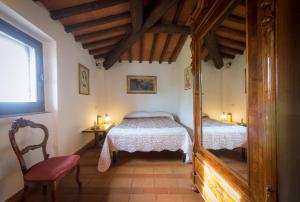 A bed or beds in a room at Agriturismo Verde Oliva