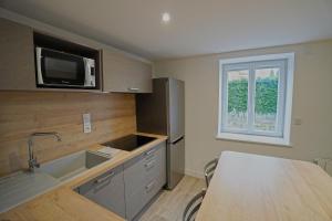 Kuchnia lub aneks kuchenny w obiekcie Bel Appartement T2 40 M²