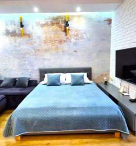 Ένα ή περισσότερα κρεβάτια σε δωμάτιο στο LUXURY BLUE CASCADE studio DOWNTOWN balcony