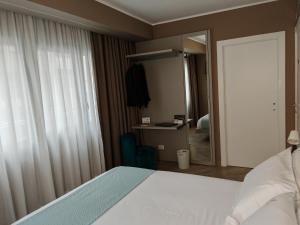 Postel nebo postele na pokoji v ubytování EFFE4 Lovely Room