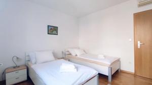 Posteľ alebo postele v izbe v ubytovaní Kruge Luxury