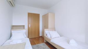 Posteľ alebo postele v izbe v ubytovaní Kruge Luxury