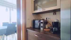 Kuchyňa alebo kuchynka v ubytovaní Kruge Luxury