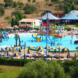 a large water park with a bunch of people in it at Casa Agostina in Pula