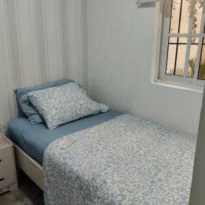 Postel nebo postele na pokoji v ubytování Nely y Pietro share apartment