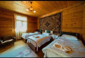 Letto o letti in una camera di VARD-CIKHE