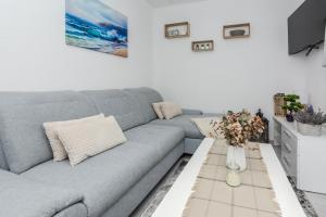Televisyen dan/atau pusat hiburan di Kele Apartment