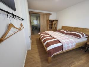 Postel nebo postele na pokoji v ubytování Apartmány U Malého prince