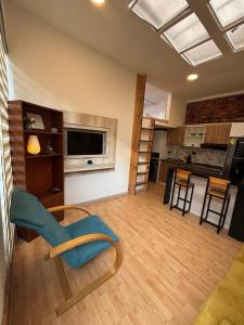 Kuhinja ili čajna kuhinja u objektu Hermoso Apartaestudio Todo Incluido Zona Céntrica