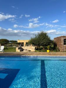 Πισίνα στο ή κοντά στο Amboseli Glass house