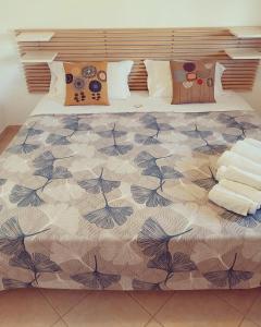 Postel nebo postele na pokoji v ubytování SUD12 - Case Vacanze sul Mediterraneo