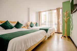 Postel nebo postele na pokoji v ubytování Hotel Natural Sevgi