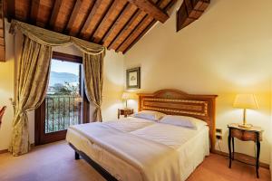 Postel nebo postele na pokoji v ubytování Villa Palma by AGF Hotels