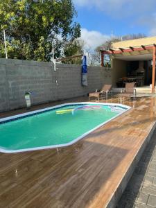Kolam renang di atau dekat dengan Casa de Praia com Piscina no Pontal do Ipiranga