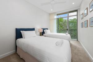Postel nebo postele na pokoji v ubytování Byron Bay Accom Beach House Vue 4 Byron Bay + 13 fotografií