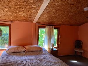 Ένα ή περισσότερα κρεβάτια σε δωμάτιο στο Cabaña entre Arboles