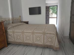 Katil atau katil-katil dalam bilik di Andalusian Beach House