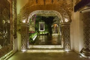 an entrance to a building with an ornate doorway at La Senoría Hotel in San Miguel de Allende