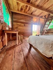 TV a/nebo společenská místnost v ubytování PuraChata Ecolodge + 37 fotografií