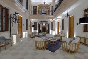 Posezení v ubytování Nueve 25 Hotel Boutique