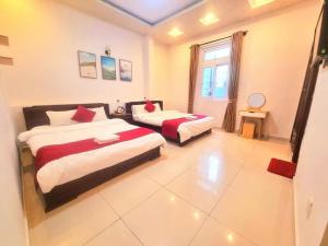 Letto o letti in una camera di Conico Đà Lạt Hotel