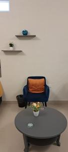 Posezení v ubytování Tres Palmas Departamentos