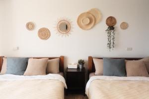 Postel nebo postele na pokoji v ubytování SolChill INN 日丘旅店 -墾丁南灣
