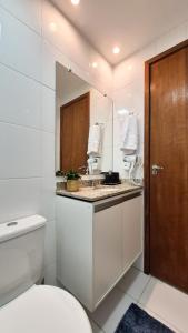 Kuchyň nebo kuchyňský kout v ubytování Ap 3Q, elegante e funcional, com estacionamento
