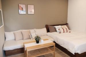 Postel nebo postele na pokoji v ubytování SolChill INN 日丘旅店 -墾丁南灣