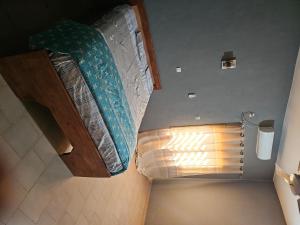 Ένα ή περισσότερα κρεβάτια σε δωμάτιο στο Entire House à Bamako