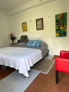 Ліжко або ліжка в номері Hostal Chirrín