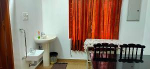 Koupelna v ubytování Kuttickattil Pool Home Stay Kumarakom
