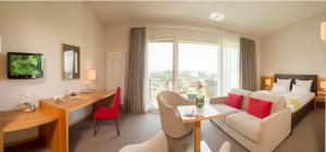 TV a/nebo společenská místnost v ubytování Hotel St Elisabeth
