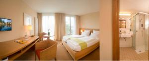 Postel nebo postele na pokoji v ubytování Hotel St Elisabeth