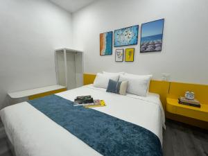 Voodi või voodid majutusasutuse Mango Apartment and Homestay - HaNoi railway station toas