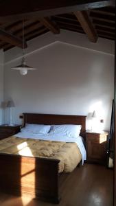 Ένα ή περισσότερα κρεβάτια σε δωμάτιο στο Residenza Zona Franca