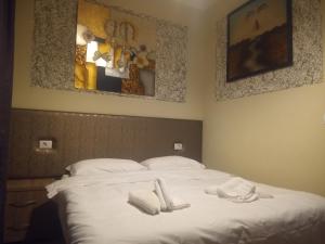 Letto o letti in una camera di Prince Hotel Fier