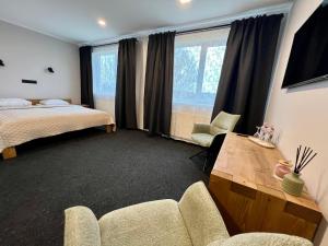 Postel nebo postele na pokoji v ubytování Hotel Sanvilla